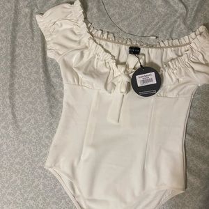 White fox XL body suit. Never worn